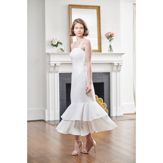 beautiful bride in elegant designer strapless white mermaid midi winter wedding rehearsal dinner dress