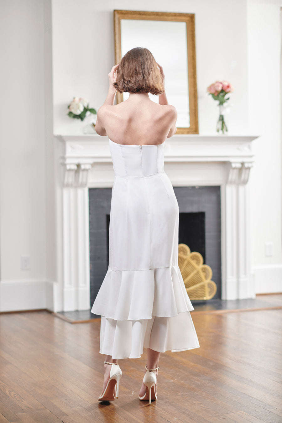 Front view of Josette strapless white tea length wedding dress with mermaid midi silhouette