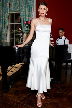 elegant bride wearing off white cocktail dress and bias cut silk slip dress wedding dress