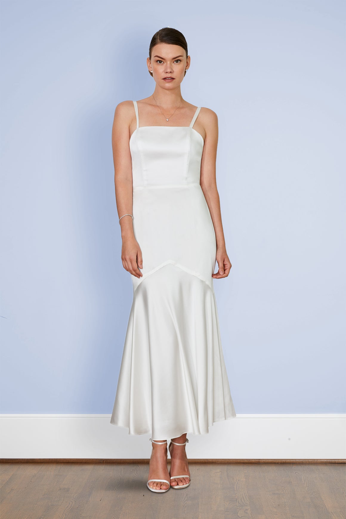Bride wearing white glamorous Gatsby inspired elegant 30s silk slip dress wedding dress and cocktail party dressr